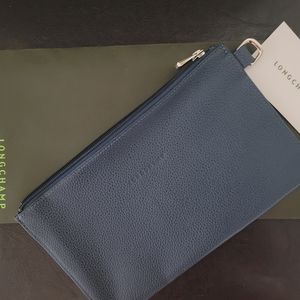 Brand new Authentic Longchamp leather clutch